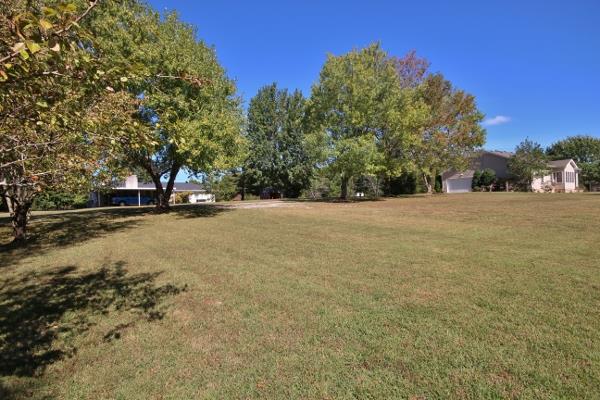 7508 King Road Fairview, TN 37062 - Photo 30 of 30 a view of dirt field with trees in the background