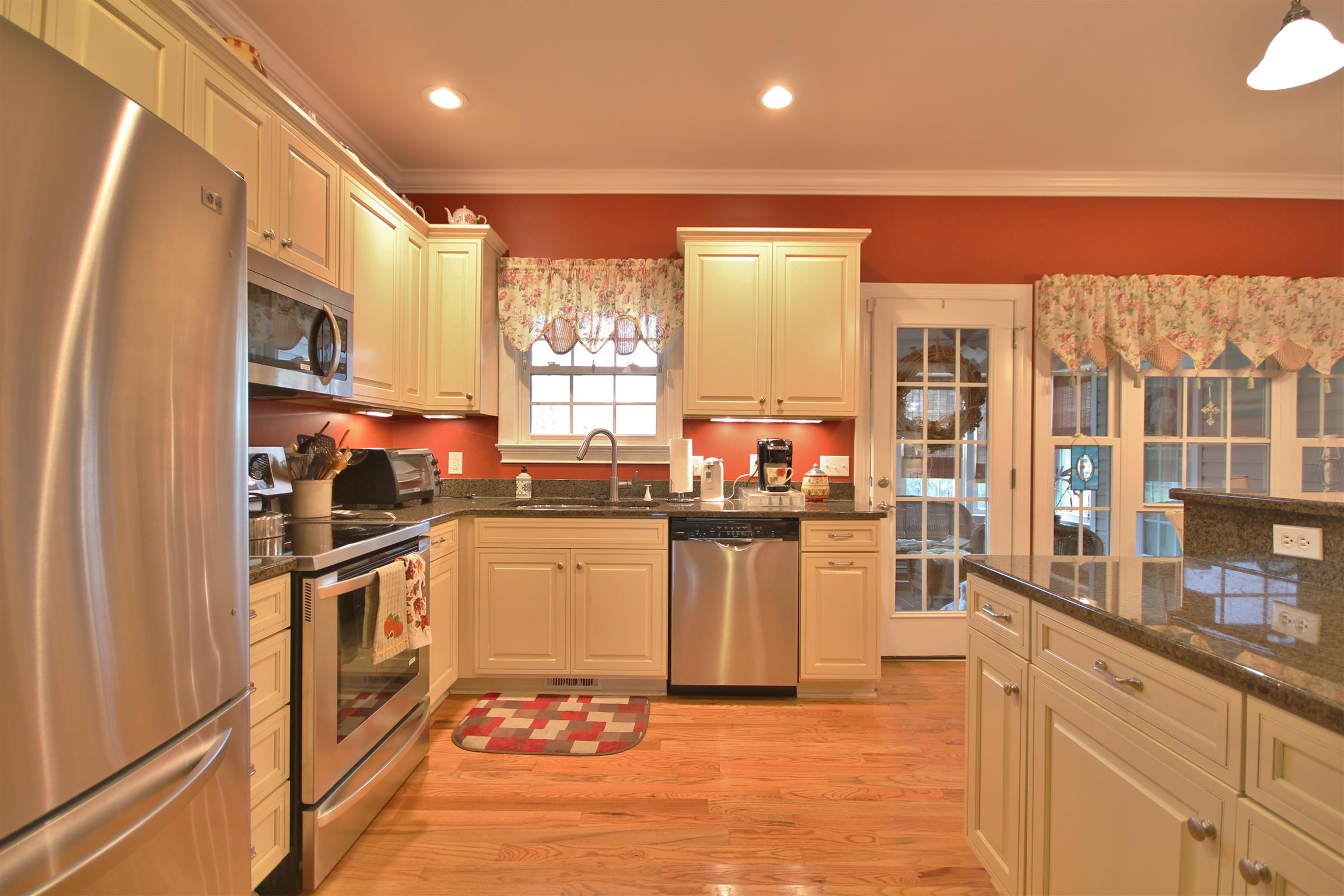 7508 King Road Fairview, TN 37062 - Photo 7 of 30 a kitchen with stainless steel appliances granite countertop a stove a sink and a refrigerator