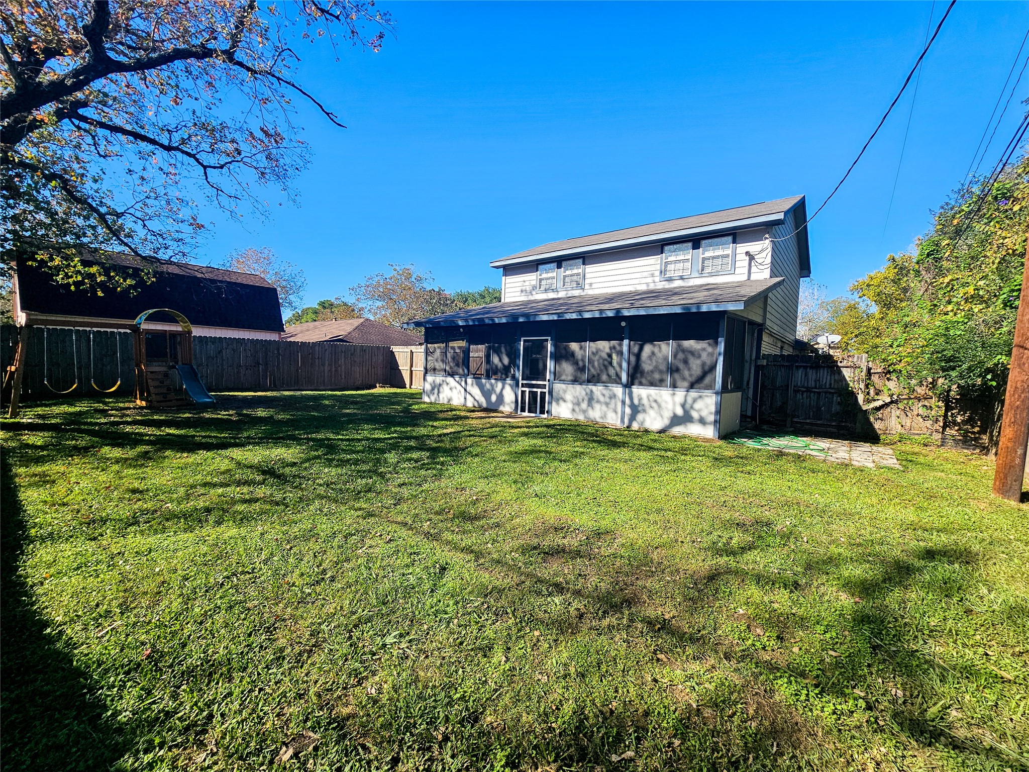 108 Oriole Lane Angleton, TX 77515 - Photo 5 of 20 a view of a house with a yard