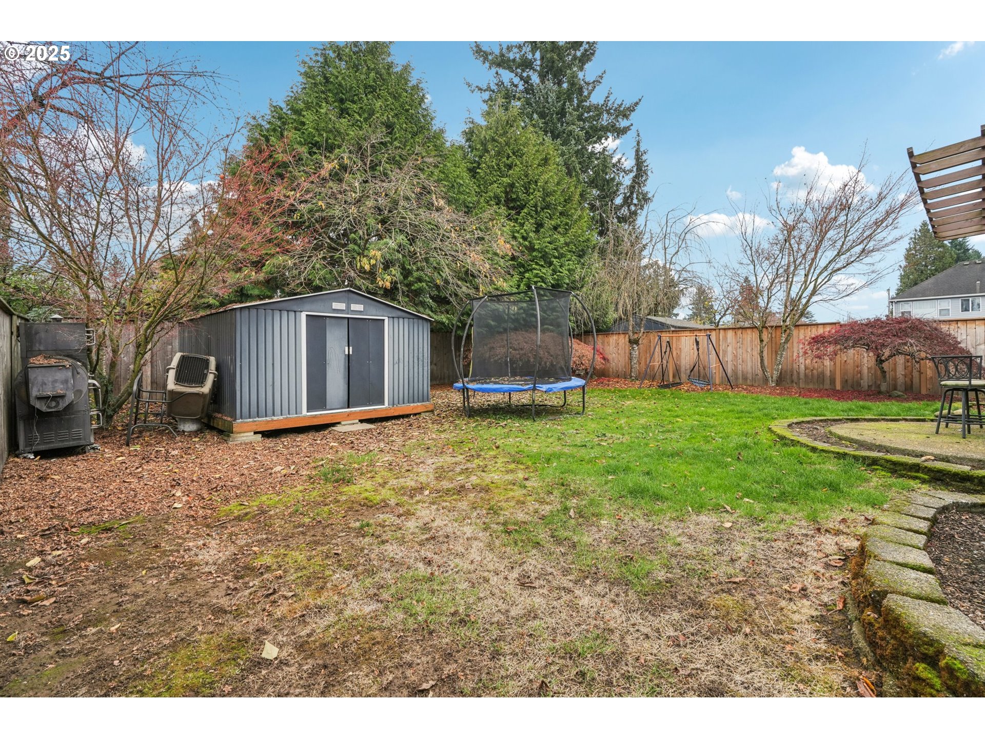 858 Northeast 166th Avenue Portland, OR 97230 - Photo 13 of 17 a view of a house with backyard and a tree