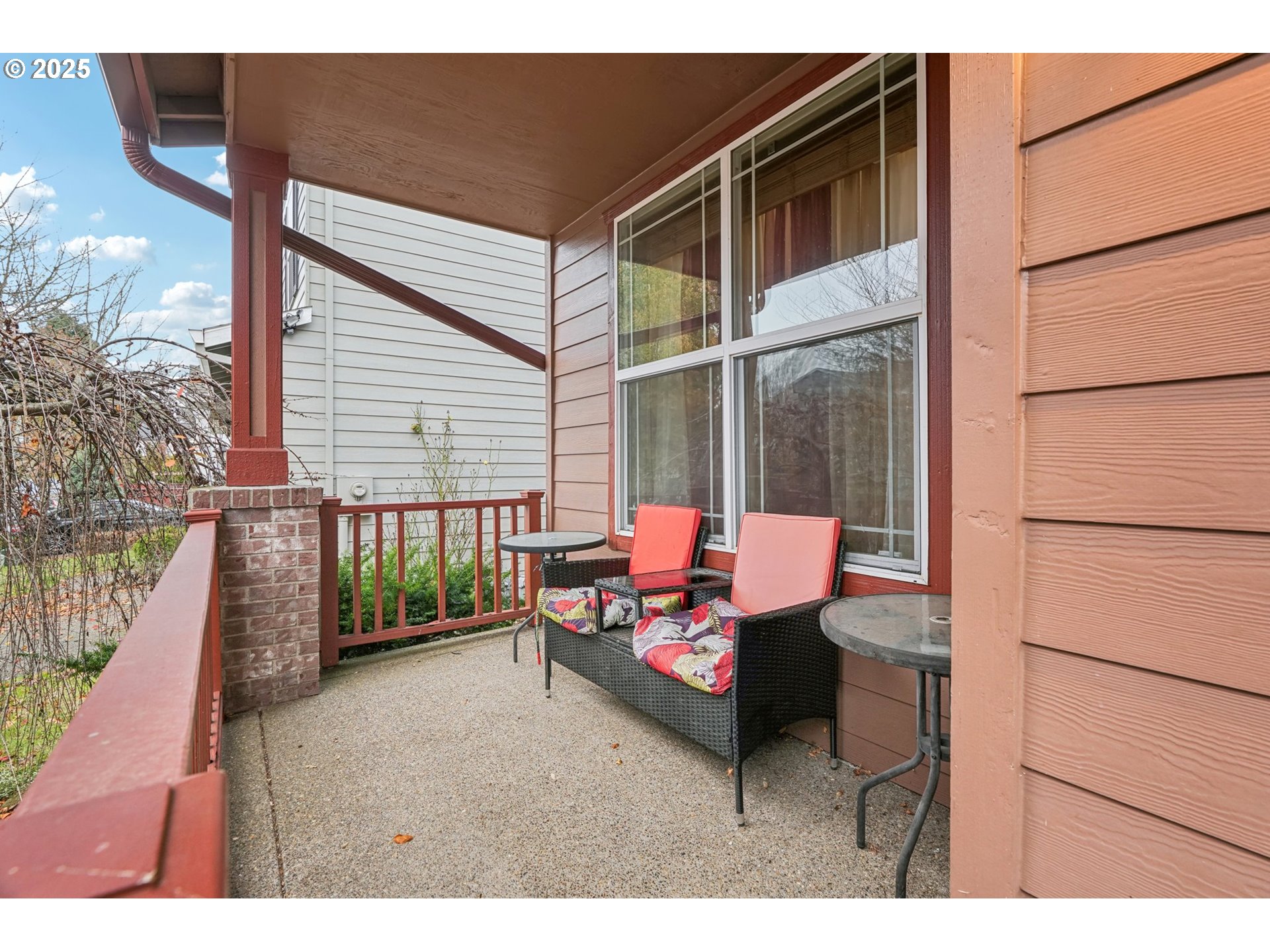 858 Northeast 166th Avenue Portland, OR 97230 - Photo 5 of 17 a balcony with a couch and painted walls