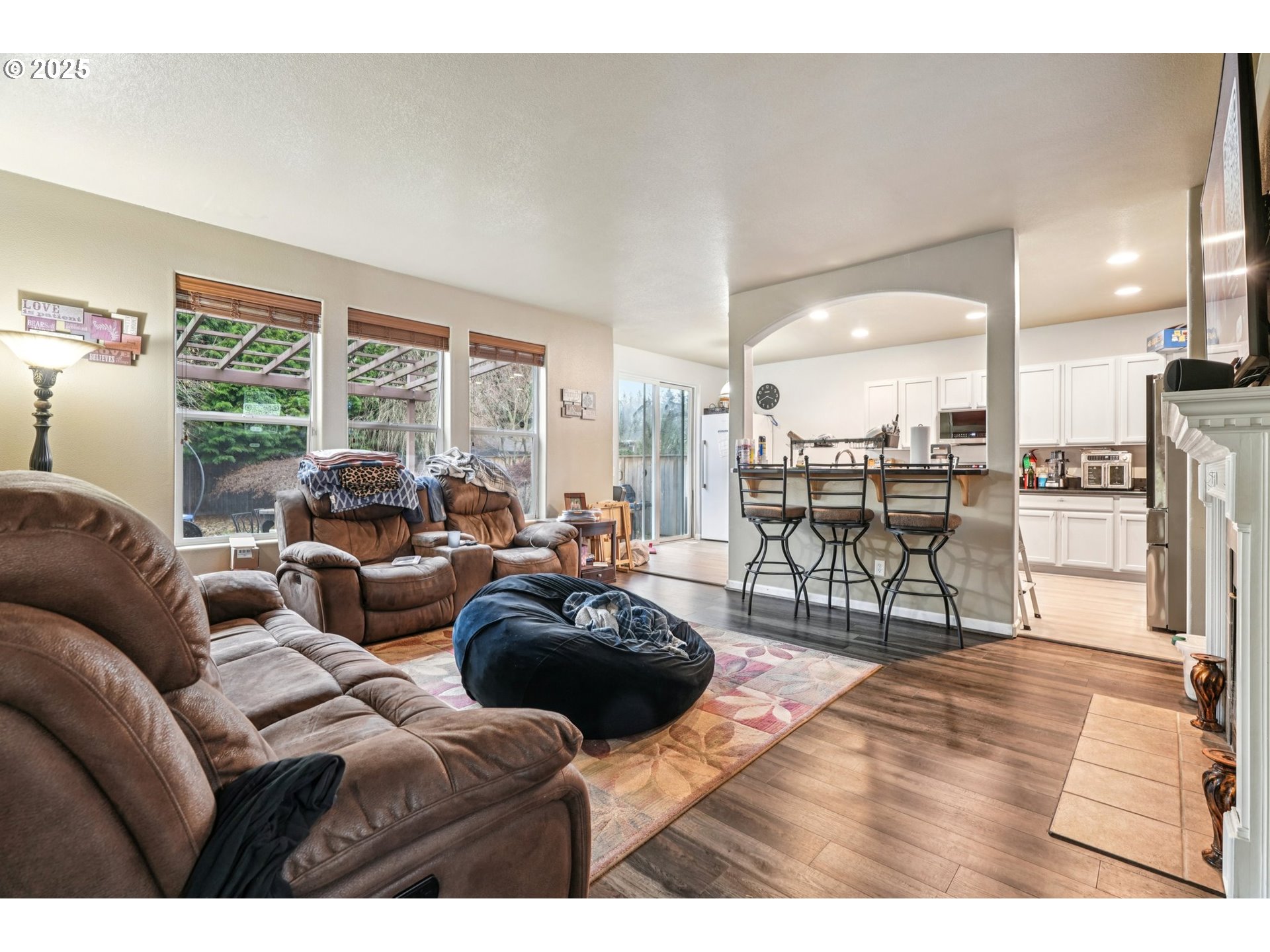 858 Northeast 166th Avenue Portland, OR 97230 - Photo 8 of 17 a living room with furniture and a large window