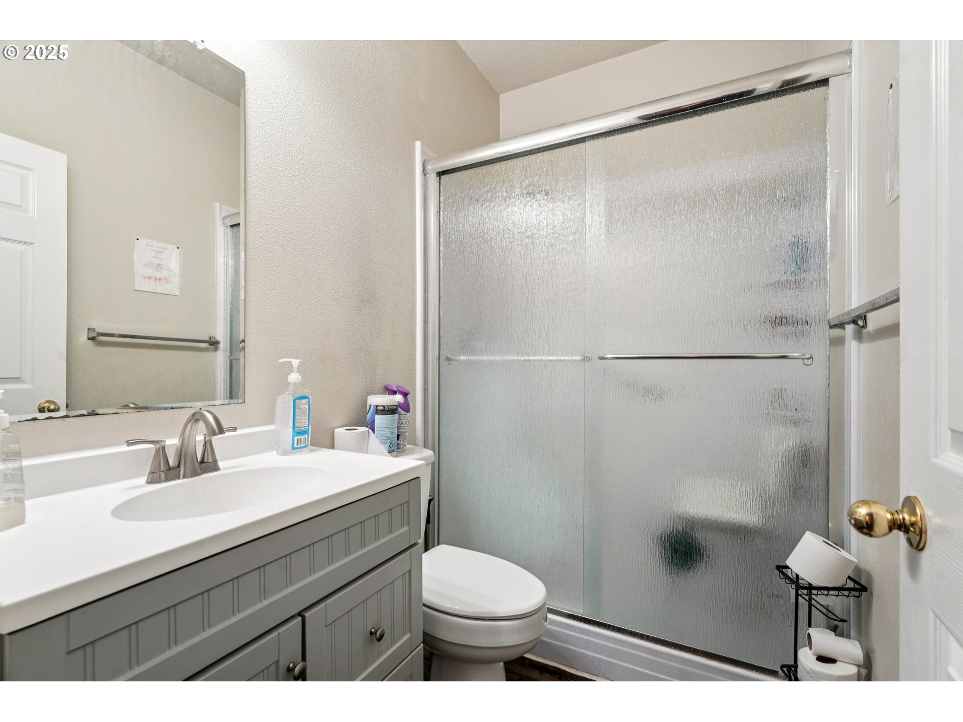 858 Northeast 166th Avenue Portland, OR 97230 - Photo 10 of 17 a bathroom with a sink toilet and shower