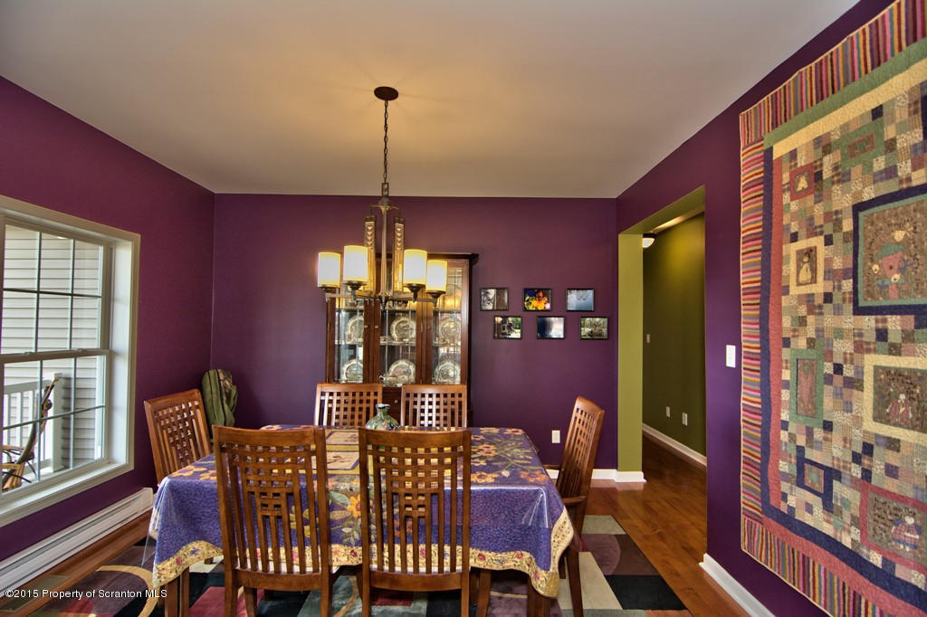 1081 Motichka Road Moscow, PA 18444 - Photo 31 of 90 a view of a dining room with furniture window and wooden floor