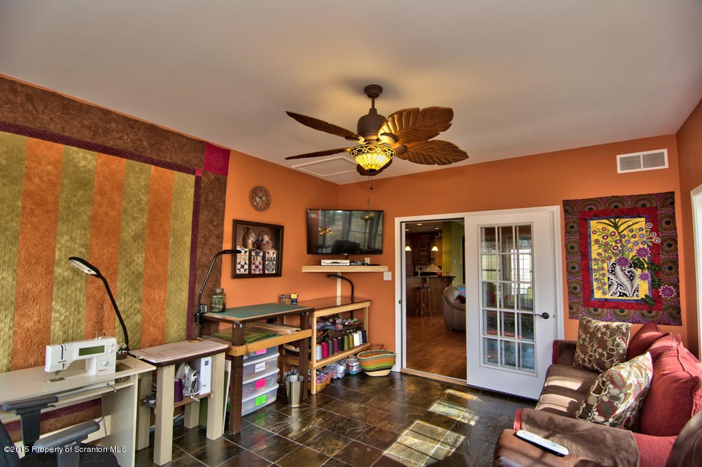 1081 Motichka Road Moscow, PA 18444 - Photo 56 of 90 a living room with furniture and a large window