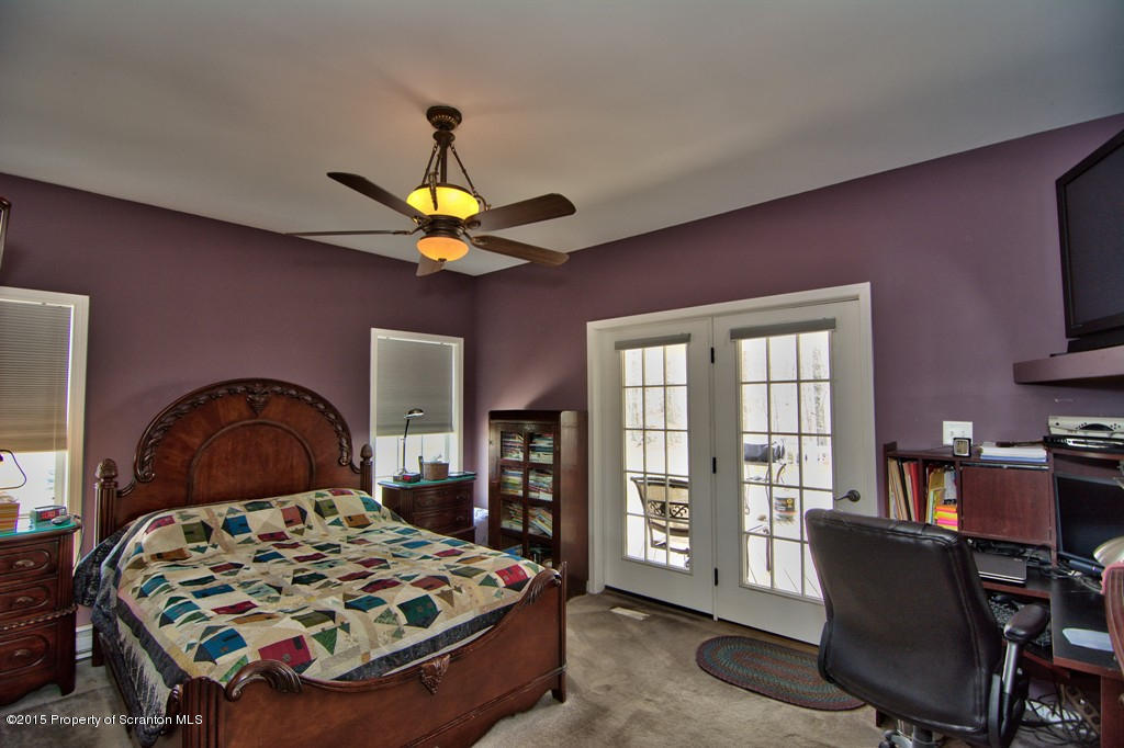 1081 Motichka Road Moscow, PA 18444 - Photo 60 of 90 a bedroom with a bed dresser and a window