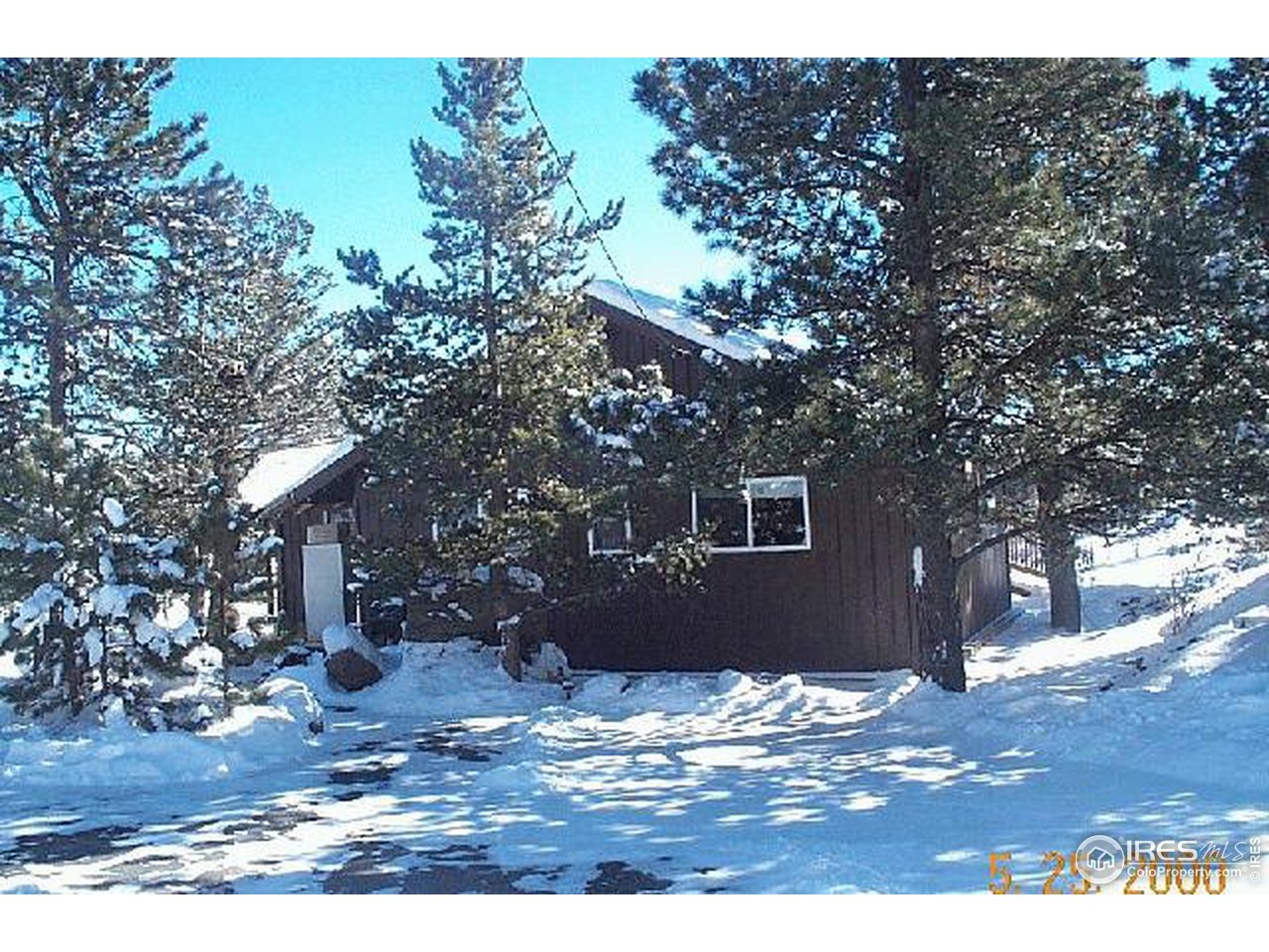 325 Ranch Road Ward, CO 80481 - Photo 1 of 5 a view of a house with a tree