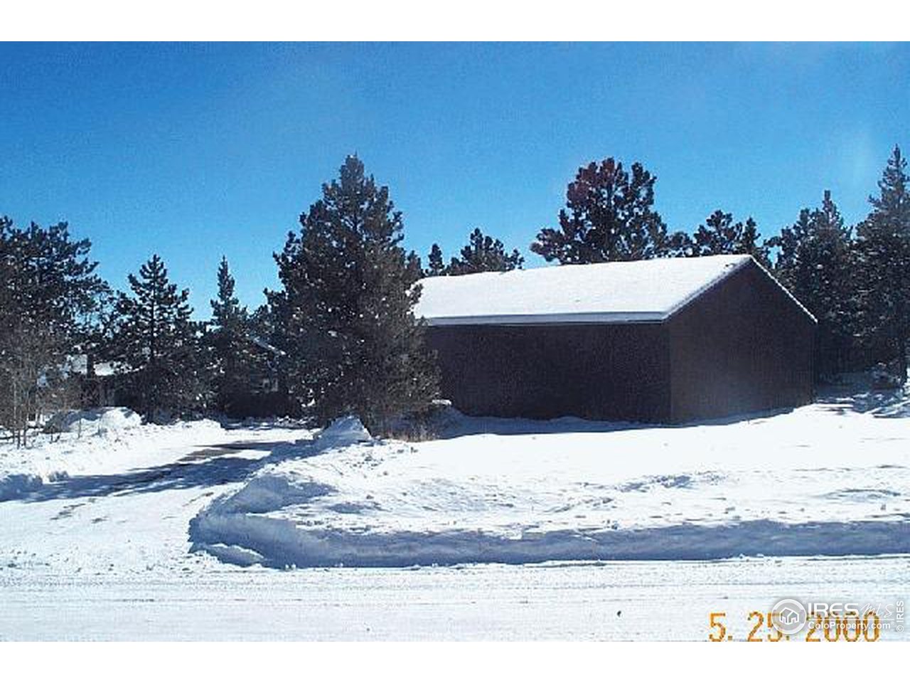 325 Ranch Road Ward, CO 80481 - Photo 5 of 5 a view of a yard covered in snow