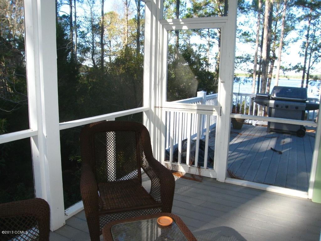 256 Thurman Road Beaufort, NC 28516 - Photo 17 of 50 Screened Porch off Kitchen