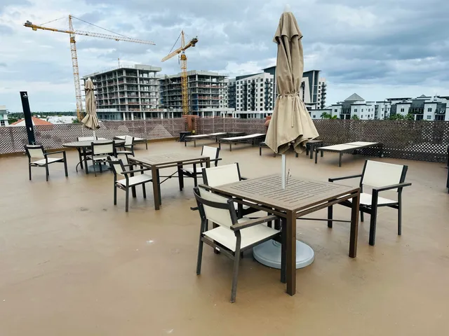 a view of a terrace with furniture and window