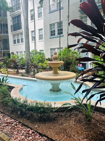 a view of a house with swimming pool