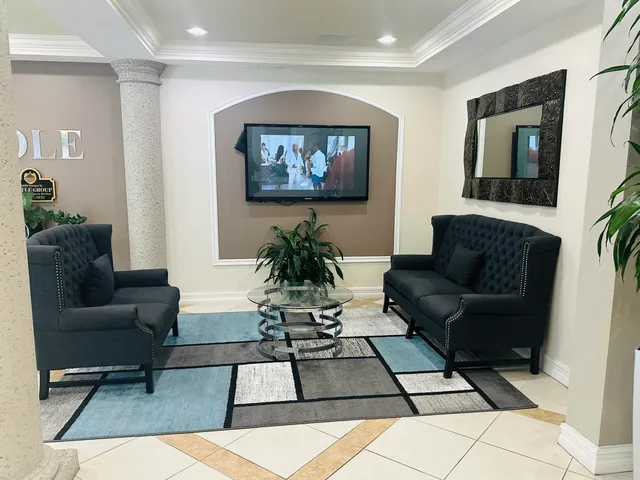 a view of a swimming pool with a lounge chairs