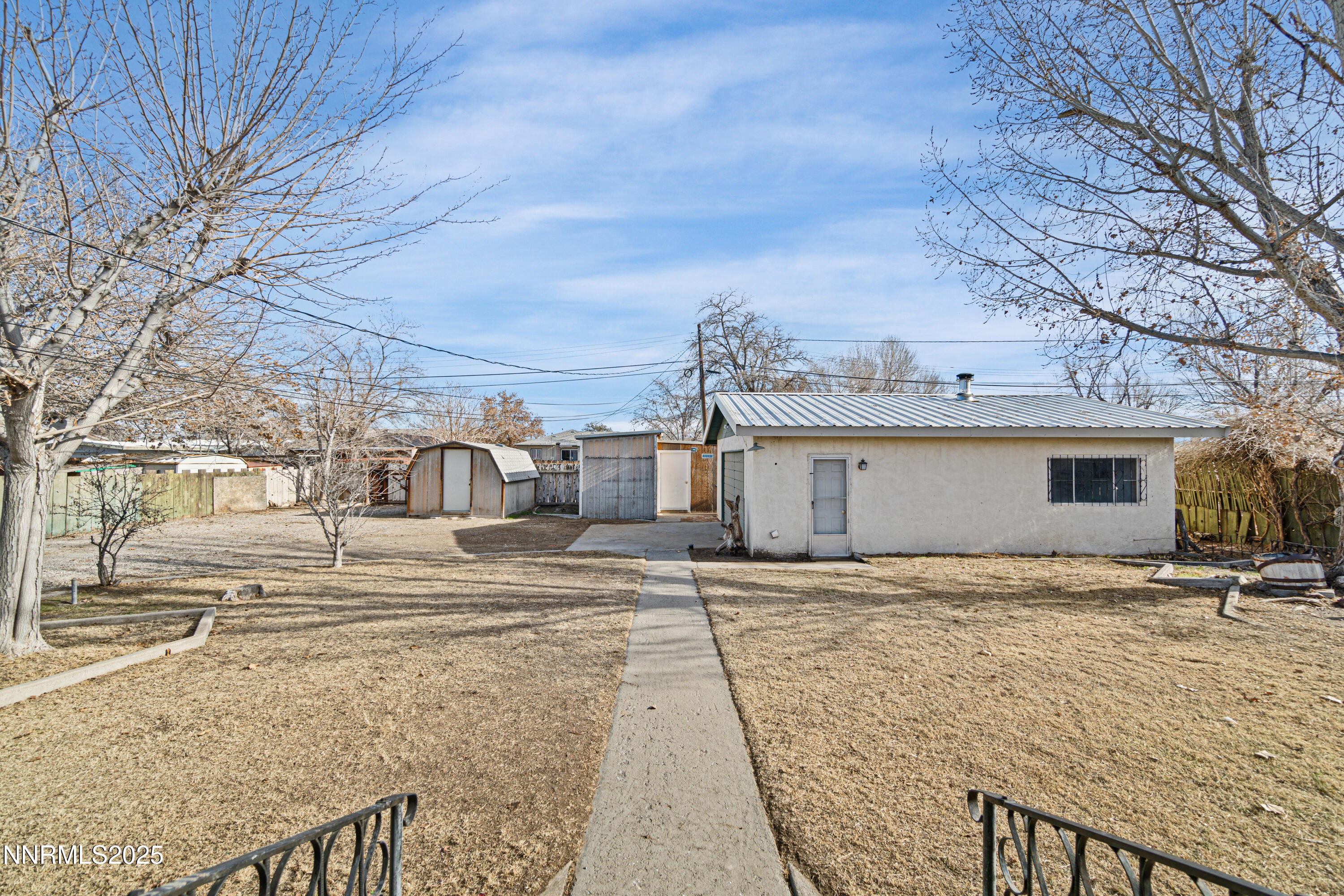 475 South Bailey Street Fallon, NV 89406 - Photo 22 of 27 a view of a house with snow on the side of the road