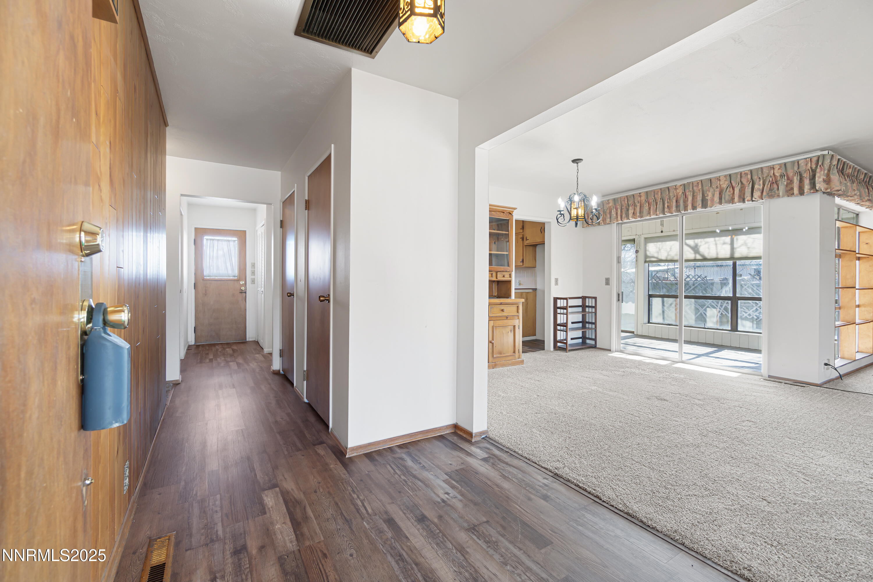 475 South Bailey Street Fallon, NV 89406 - Photo 5 of 27 wooden floor in an empty room with a window