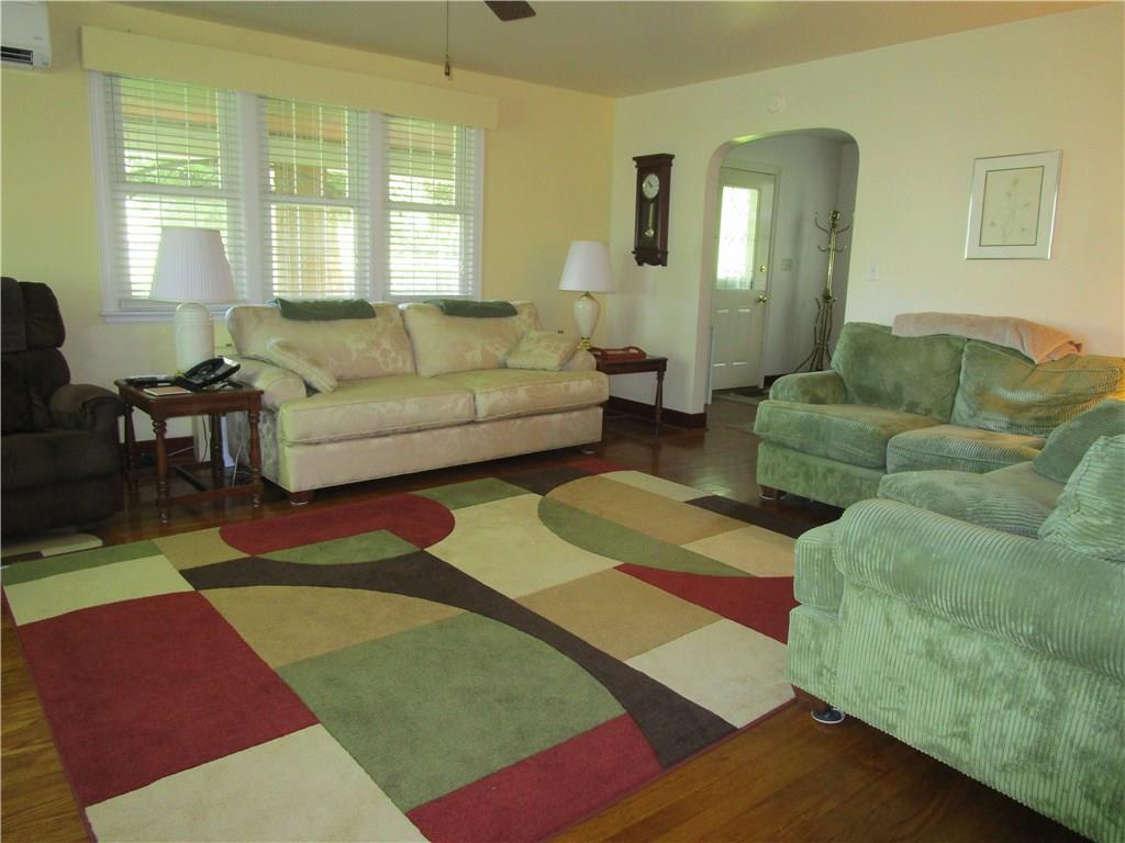 941 Youngstown Ridge Road Latrobe, PA 15650 - Photo 5 of 20 Living room with beautiful hardwood floors and lots of light.