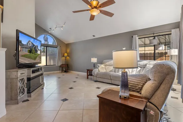 a bedroom with a bed dresser and a window