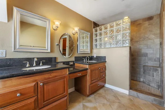 a view of a livingroom with workspace and a window