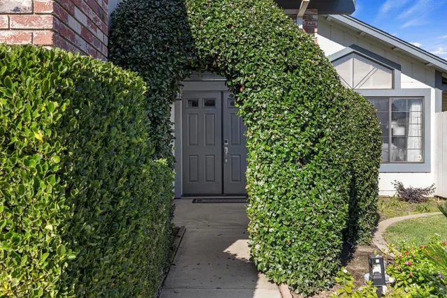 a kitchen with a cabinets and wooden floor