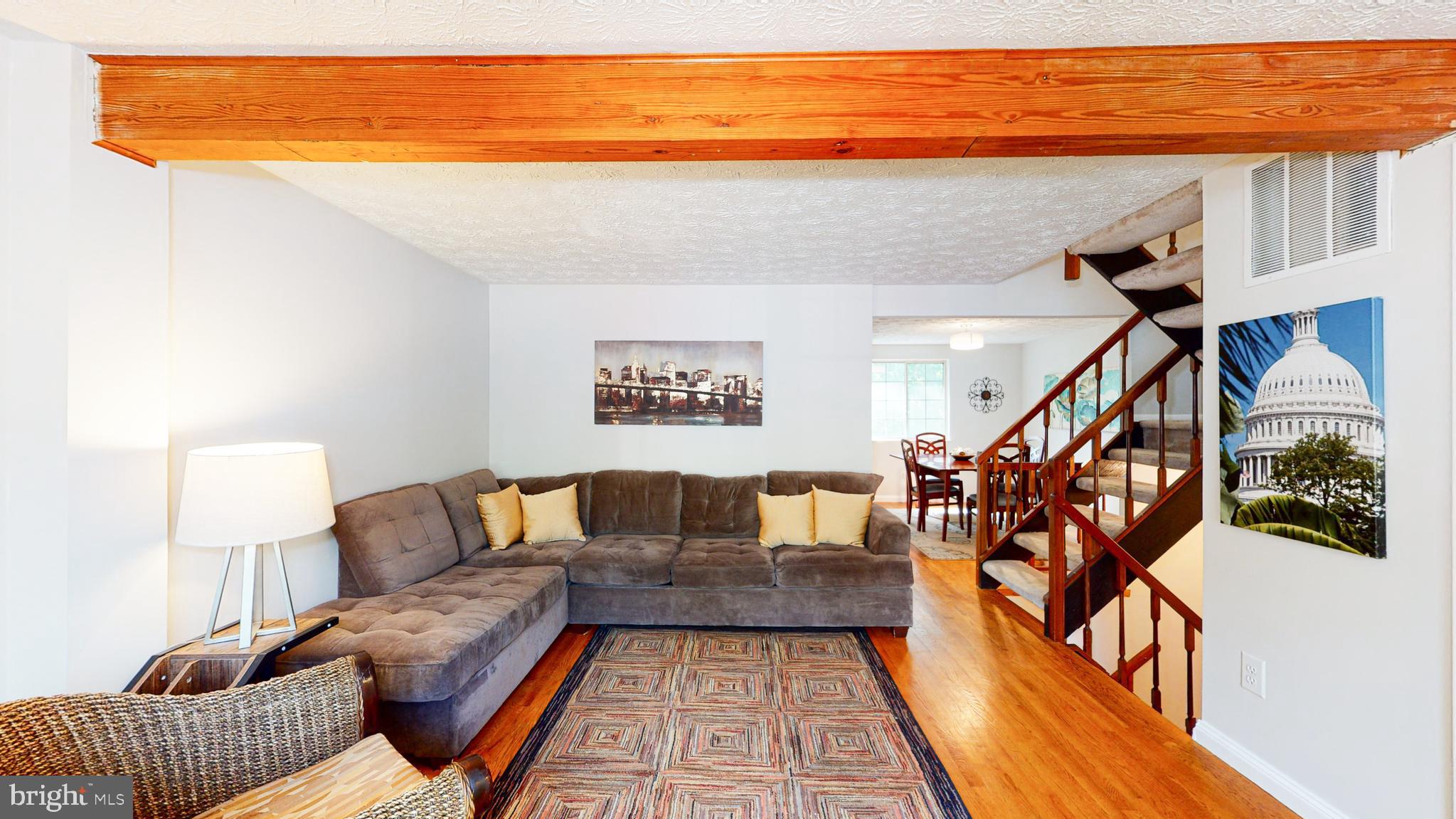 11507 Ivy Bush Court Reston, VA 20191 - Photo 3 of 32 Large living room (12x16) with hardwood floors