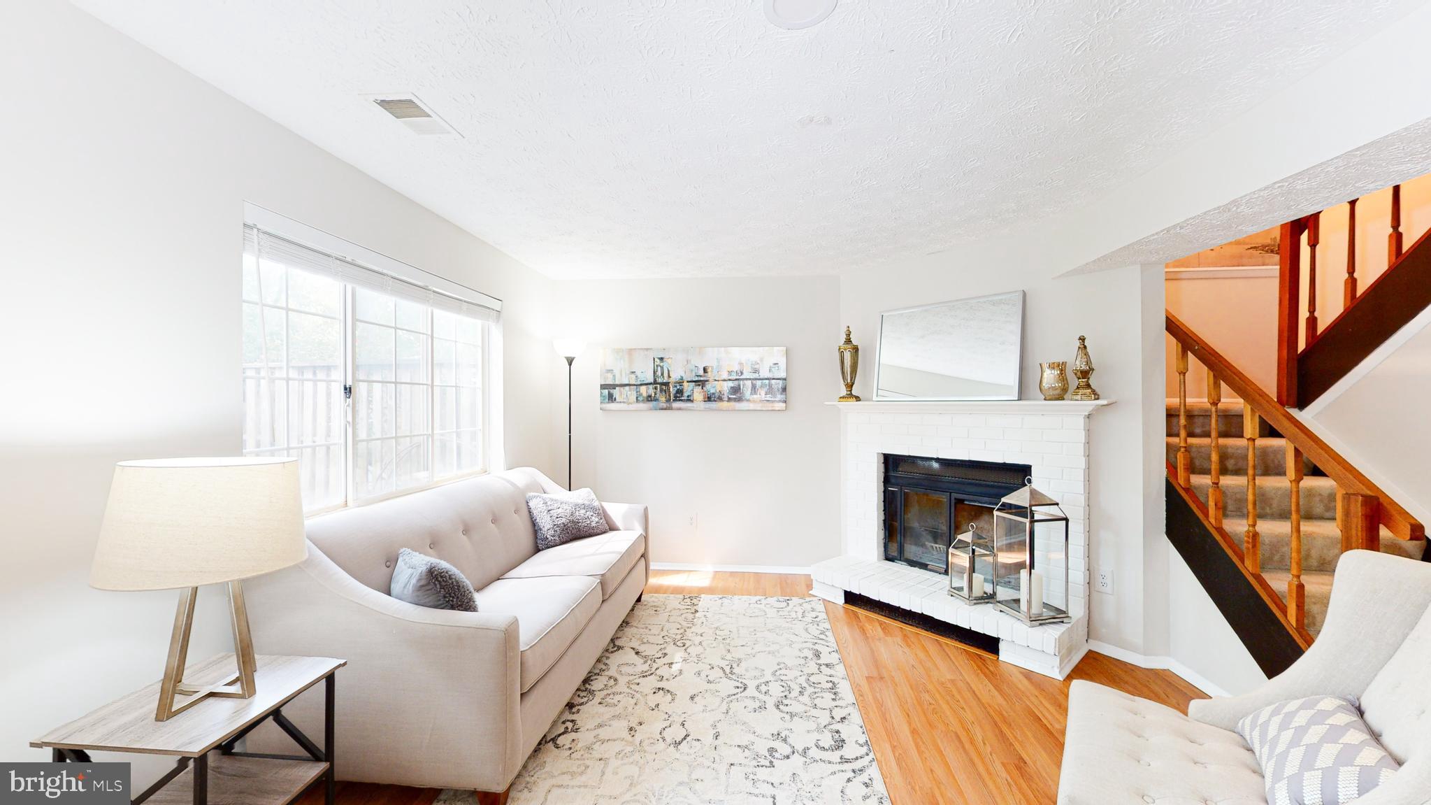 11507 Ivy Bush Court Reston, VA 20191 - Photo 23 of 32 Huge rec room with cozy wood burning fireplace