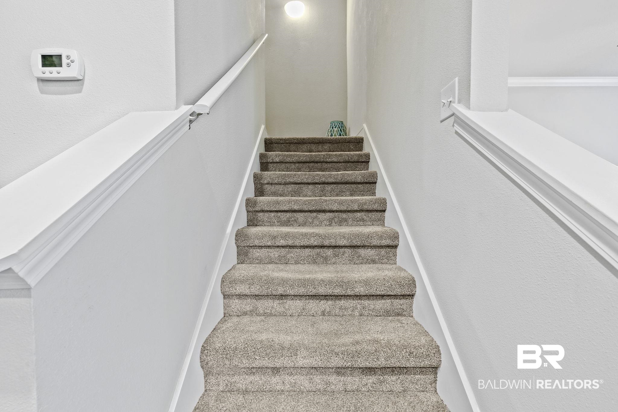 6867 Spaniel Drive, Unit B Daphne, AL 36527 - Photo 14 of 36 View of stairs