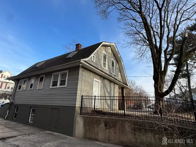 a view of a house with a roof deck