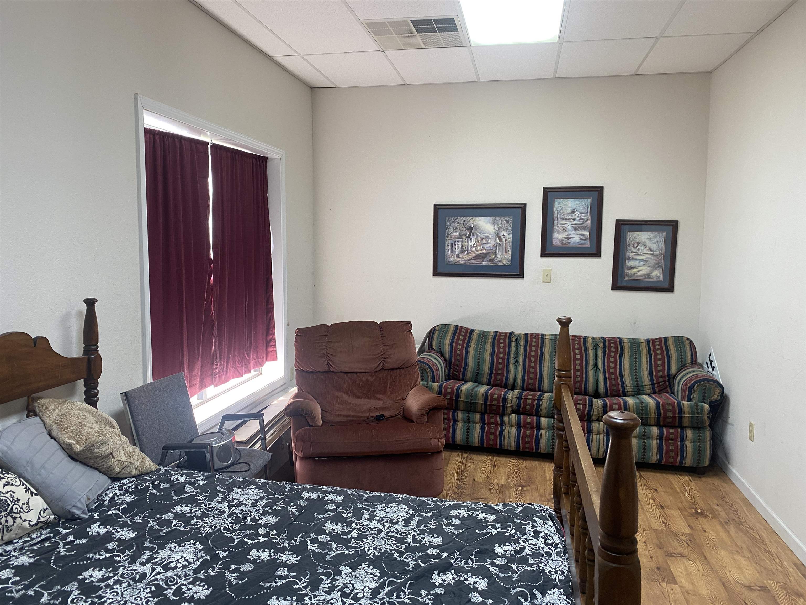 795 Center Point Road North Reagan, TN 38368 - Photo 20 of 40 a living room with furniture rug and wooden floor