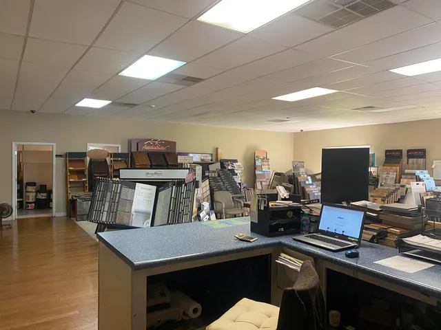 a view of a workspace with furniture