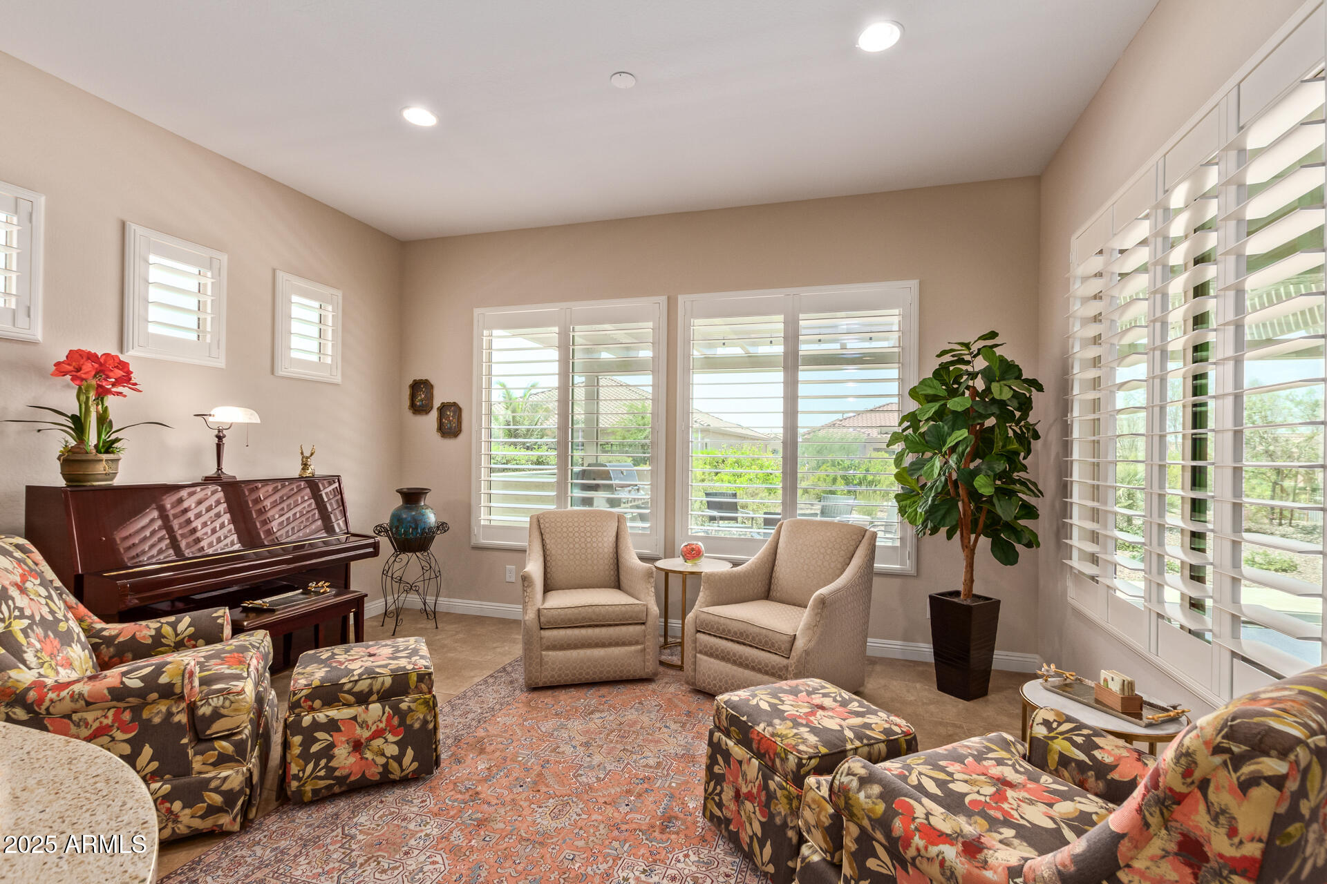 4190 North Imperial Court Florence, AZ 85132 - Photo 18 of 93 a living room with furniture and a large window