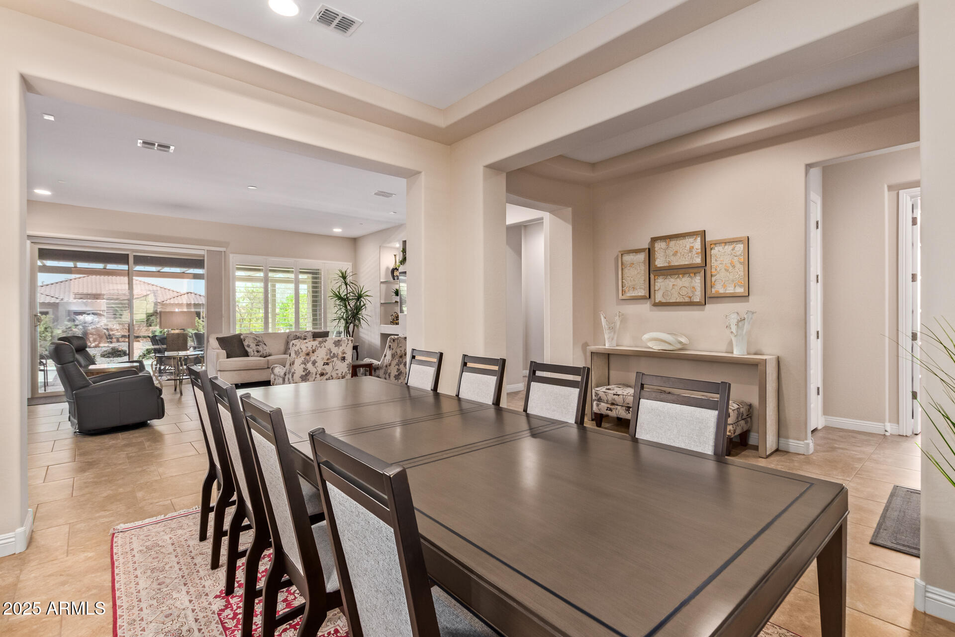 4190 North Imperial Court Florence, AZ 85132 - Photo 23 of 93 a view of a dining room with furniture and wooden floor