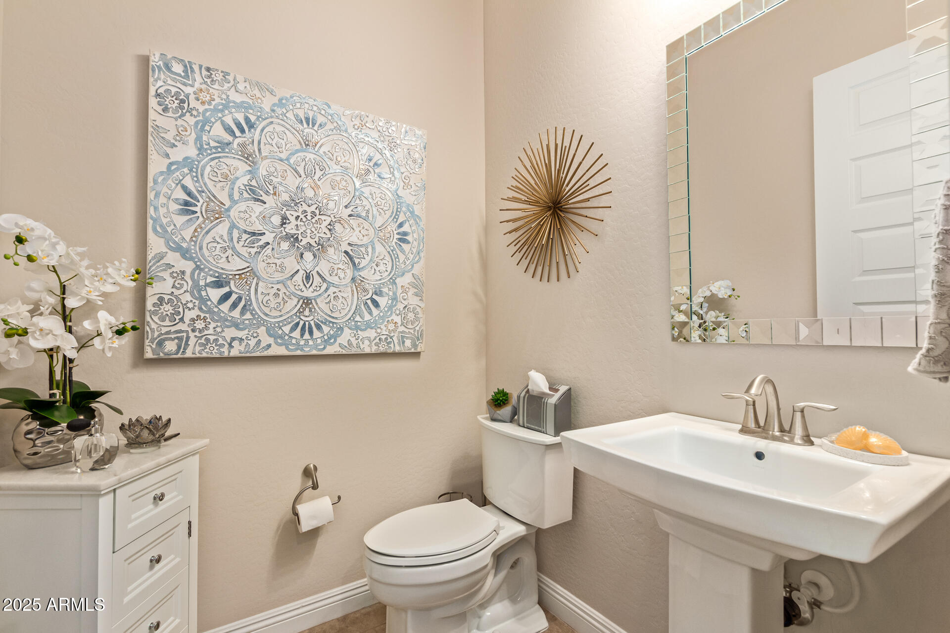 4190 North Imperial Court Florence, AZ 85132 - Photo 34 of 93 a bathroom with a toilet sink and mirror