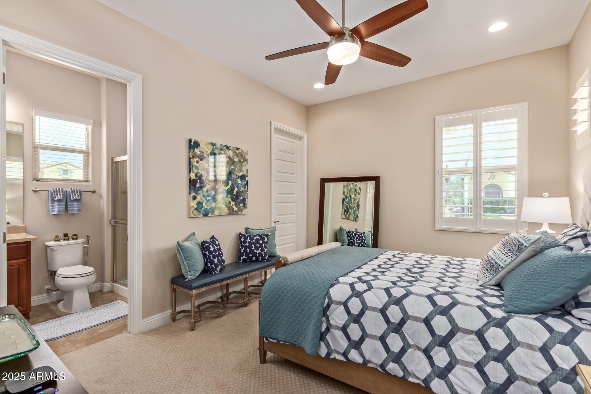 4190 North Imperial Court Florence, AZ 85132 - Photo 46 of 93 a bedroom with a large bed and a couch