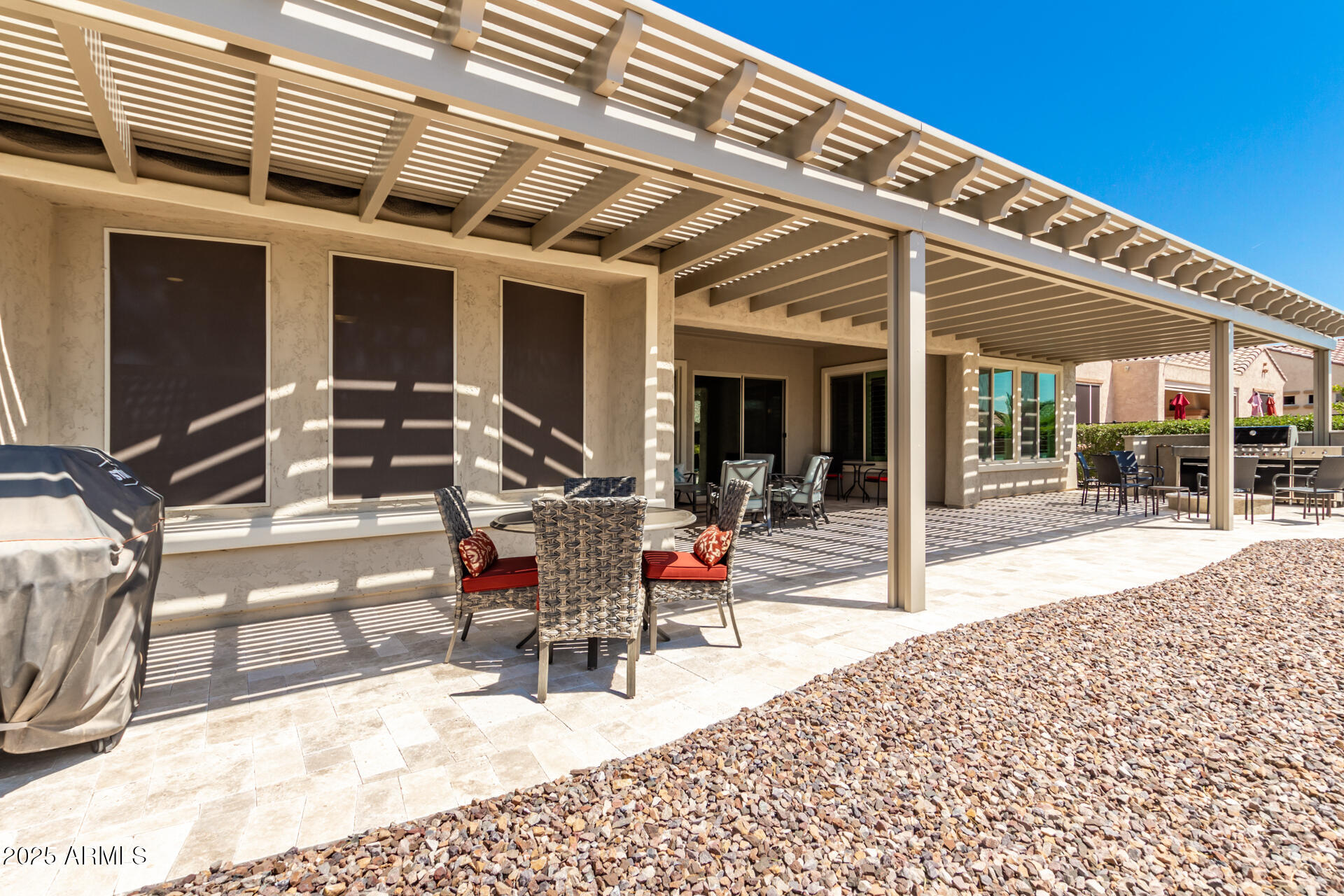 4190 North Imperial Court Florence, AZ 85132 - Photo 60 of 93 a view of a patio with table and chairs near a barbeque