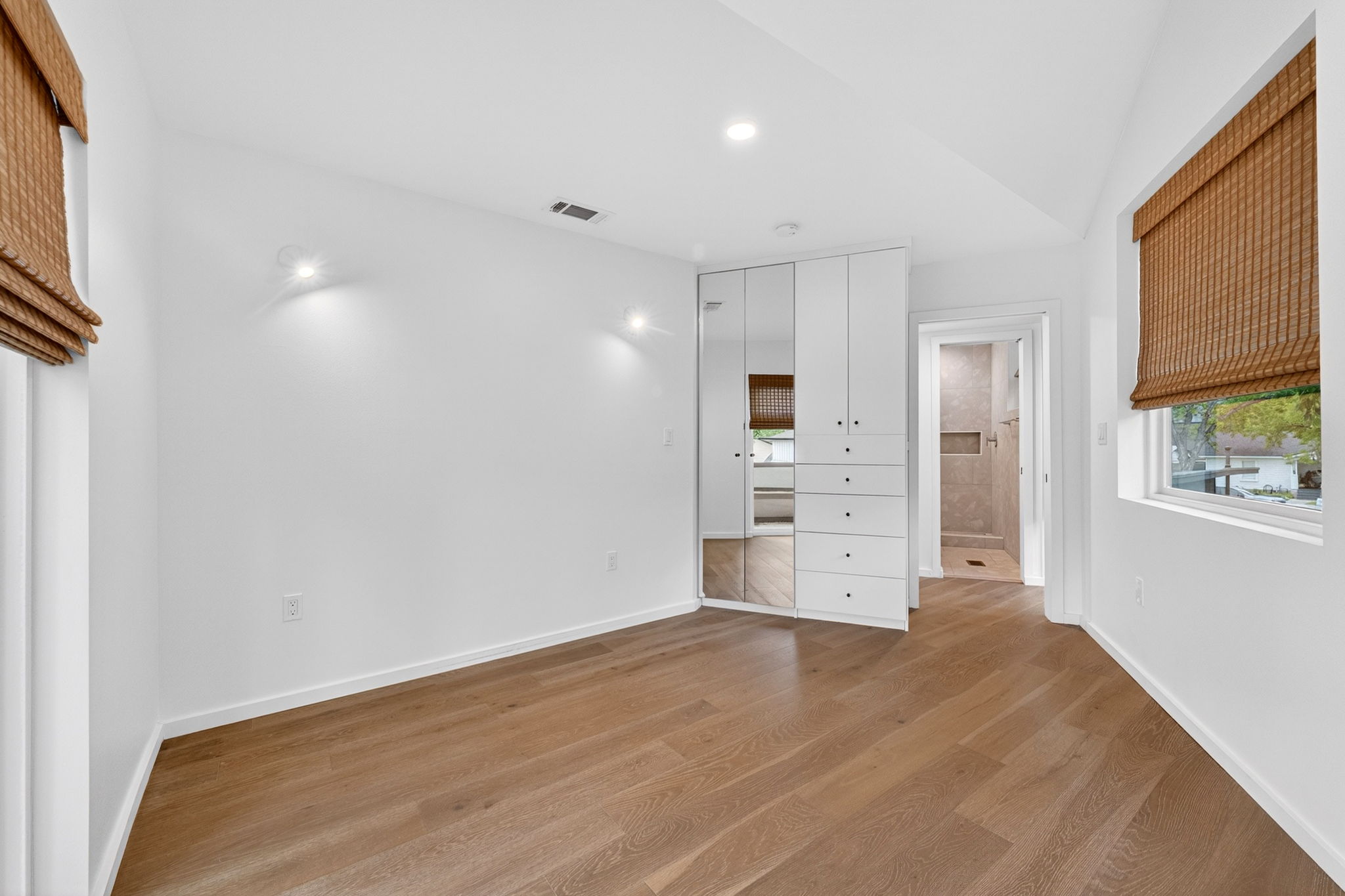 5505 Duval Street, Unit B Austin, TX 78751 - Photo 19 of 32 a view of a kitchen with wooden floor and a window