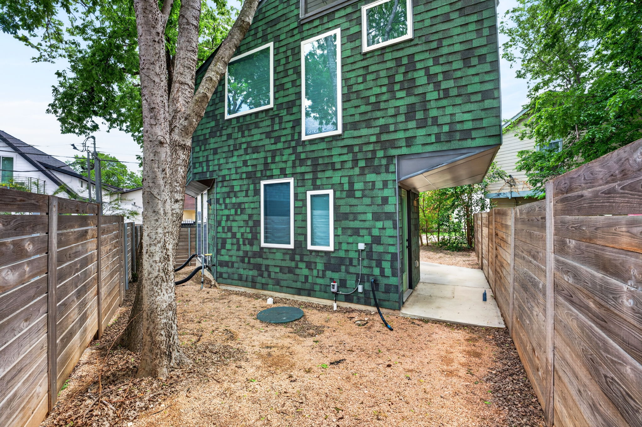 5505 Duval Street, Unit B Austin, TX 78751 - Photo 29 of 32 a backyard of a house with lots of green space