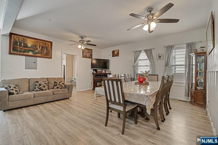 321 Grove Street Bloomfield, NJ 07017 - Photo 11 of 22 a view of a dining room with furniture and wooden floor