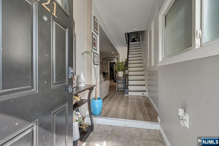 321 Grove Street Bloomfield, NJ 07017 - Photo 3 of 22 a view of entryway and hall with wooden floor