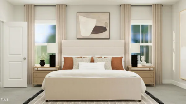 a bedroom with a large bed and a window