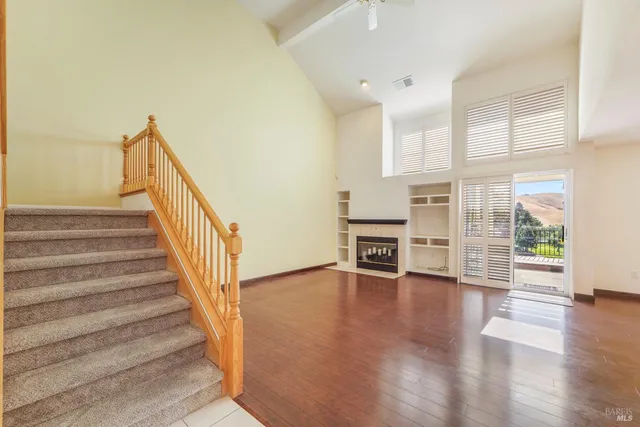 a bathroom with a double vanity sink mirror and shower