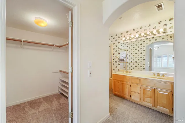 a view of a backyard with sitting area