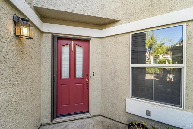a large kitchen with stainless steel appliances granite countertop a refrigerator and a sink