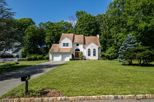 a aerial view of a house with garden