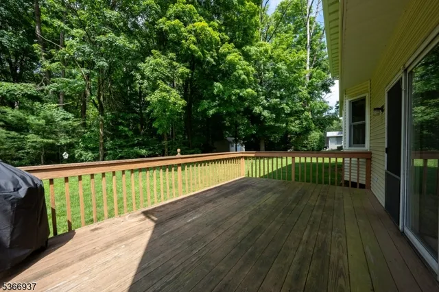 a view of balcony and wooden floor