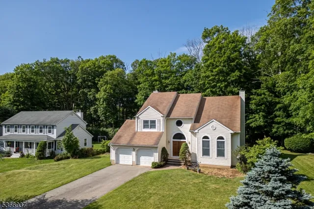 an aerial view of a house with garden