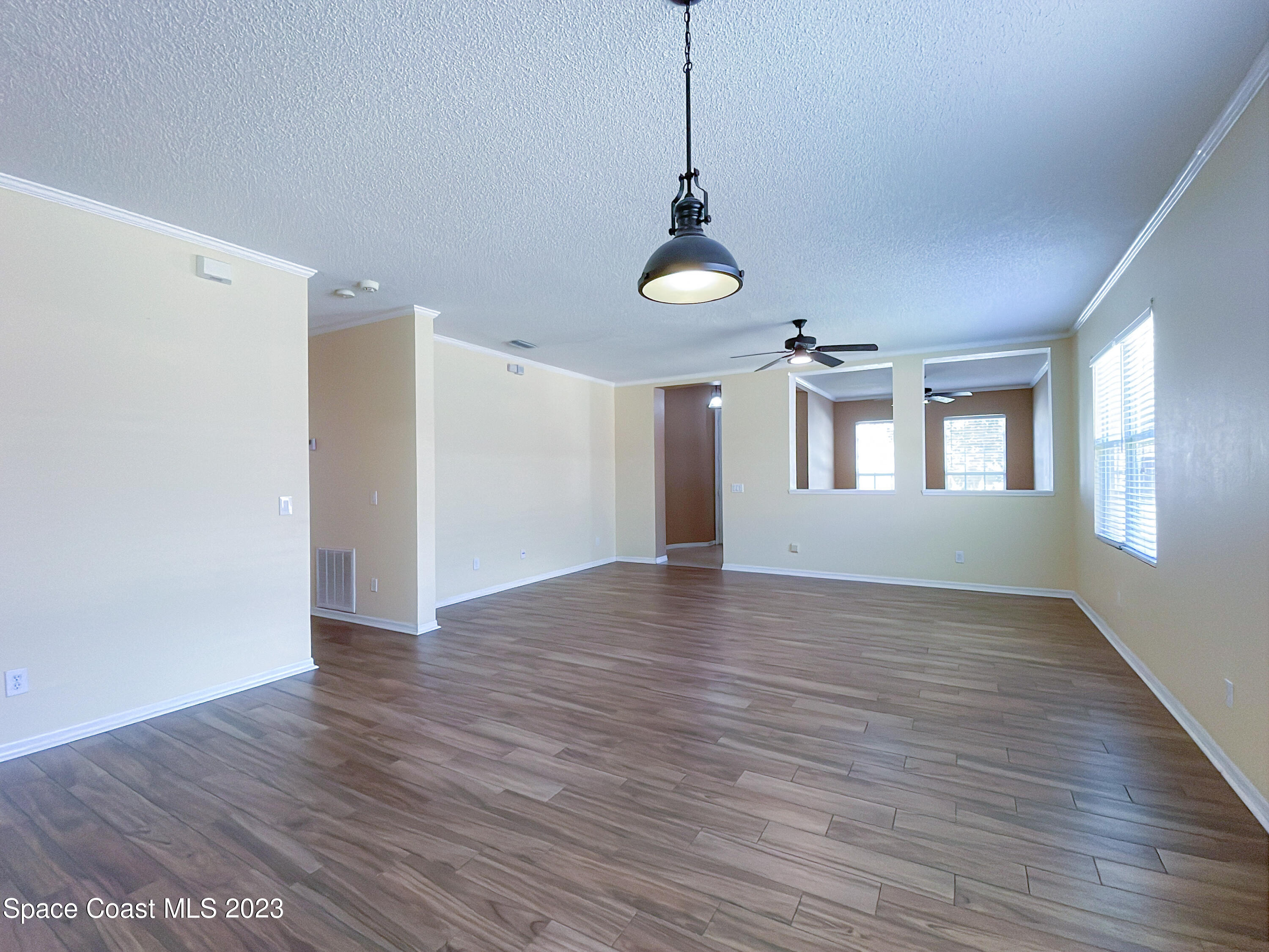 978 Riviera Point Drive Rockledge, FL 32955 - Photo 8 of 29 Living Room from Kitchen
