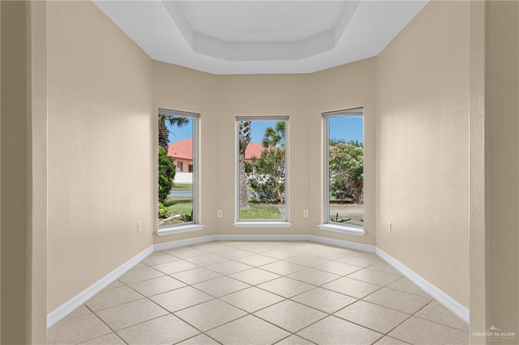 112 Madelyn Rose Bayview, TX 78566 - Photo 12 of 41 an empty room with windows
