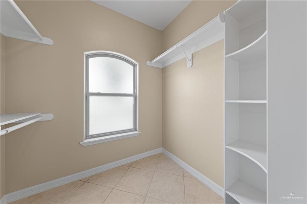 112 Madelyn Rose Bayview, TX 78566 - Photo 22 of 41 a view of an empty room with a window