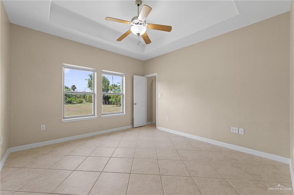 112 Madelyn Rose Bayview, TX 78566 - Photo 27 of 41 a view of an empty room with a window