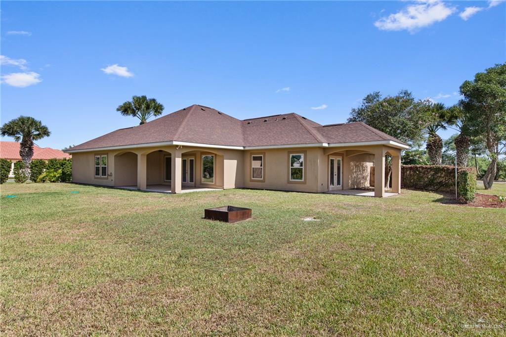 112 Madelyn Rose Bayview, TX 78566 - Photo 31 of 41 a house with swimming pool in front of it