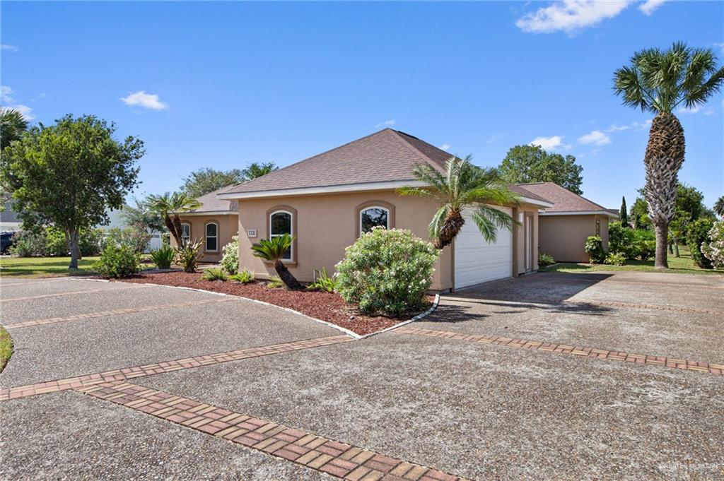 112 Madelyn Rose Bayview, TX 78566 - Photo 33 of 41 front view of a house with a street
